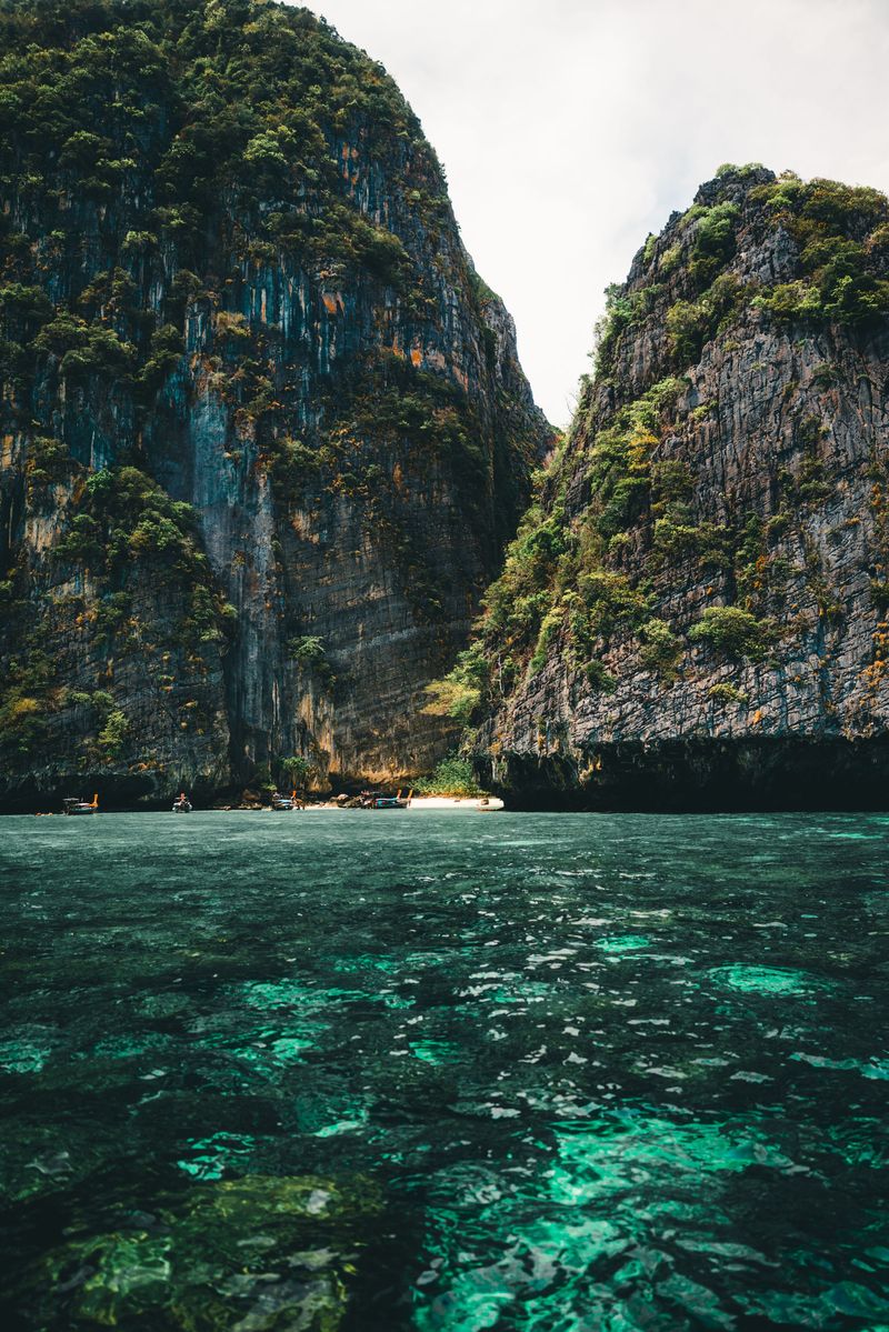 Limestone cliffs above turquoise water near Phuket